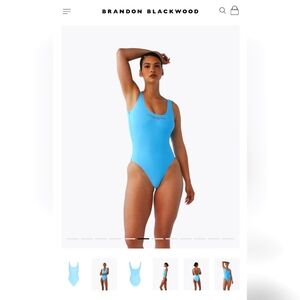 Brandon Blackwood baby blue and red one piece bathing suit